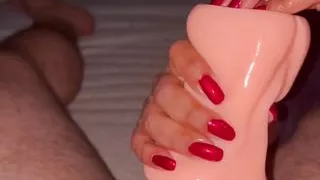 Deep red nails handjob with fake pussy