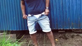 Pee desperation: Peeing my jeans shorts in a storm