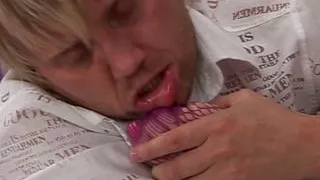 A busty blonde MILF licking warm cum off her amazing feet