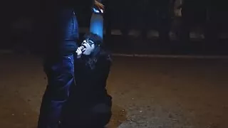 Milf whore gives a blowjob on a leash in a public place