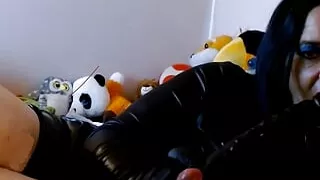 Leather Moniq sucks two cocks