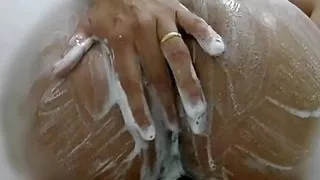 Wasshing my big bubble butt at shower in the bathroom