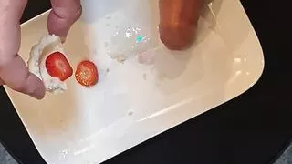 Jerking off on strawberry cake