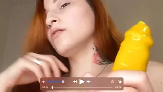 Redhead Asian girl sucks dildo and takes a rough throat