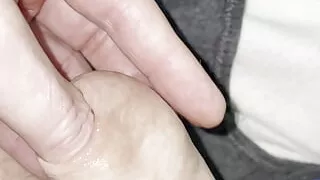sliding my thumb in my uncut dick