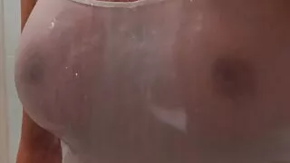 Wifey gets her big tits wet in the shower braless