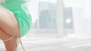 Beautiful women's feet in high heels and tights