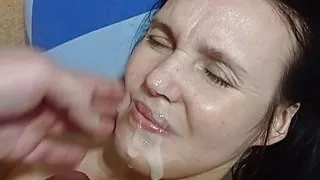 cum on my wife's face while she fucks herself with a dildo.