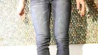 Wetting myself in jeans in bathroom...