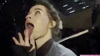 Girlfriend gets down on her knees in public and gives her boyfriend a blowjob which he films