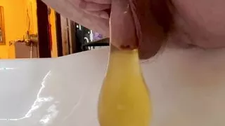 Warm Morning Yellow Piss Into a Condom