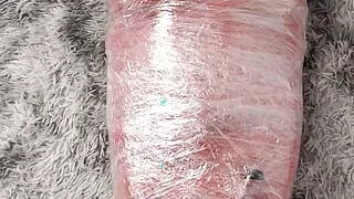 NANA Mummified with red plastic tape and then played with for orgasms