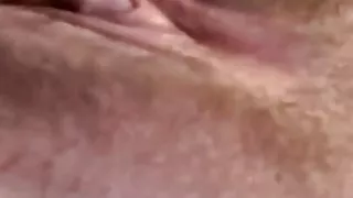 Close up black dildo in wet pussy
