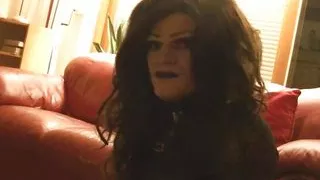 black haired tranny smoking a cigar