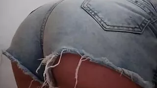 Femboy tanned in sexy mini shorts