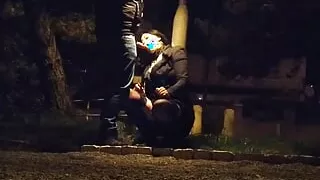 Cock sucking under the night light