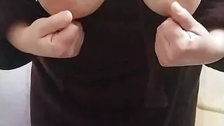 A fat bitch caresses her nipples with electric shocks.