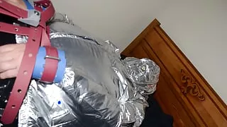 Jun 14 2022 - Rubber Boy gets tied up & breath controlled in silver nylon