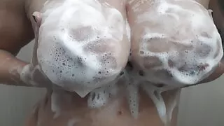 I take a shower and when I touch myself I end up masturbating and inserting a big white penis.