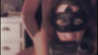 Masked dogging in front of the mirror