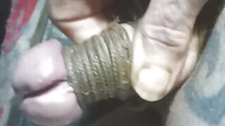 Tied up cock shaft squirting piss out of tiny little small cock head