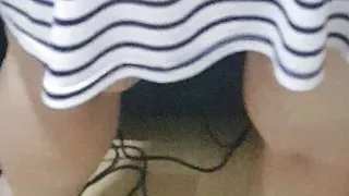 Housewife cleaning living room without panties under mini skirt