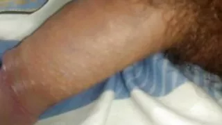 Young Colombian porn with a big penis masturbates for a lot of milk