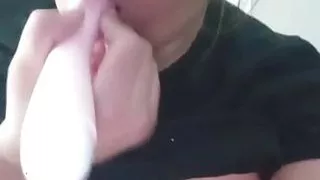 Shoving dildo from behind