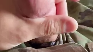 No cum yet - but some precum as an army soldier plays with his hard cock in uniform
