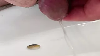 Small penis takes a pee