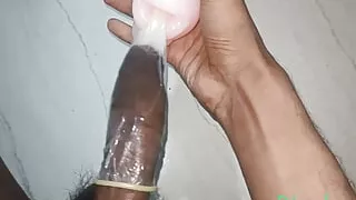 Fucking a mouth sex toy using condom and cum in condom inside mouth sex toy