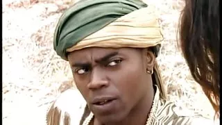 Beautiful brunette in exotic costume sucks black dick