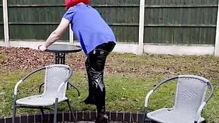 television  cumslut nottstelevision slut in the garden satin blouse and tight pvc leggings