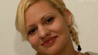 Blonde milf with her legs held 180 degrees to screw her pussy with the sex toy