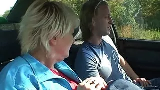 Dude pounds blonde granny in his car