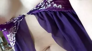 A hot mom wears lingerie and teases her stepson.