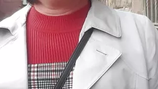 Crossdressing slut exposes her caged cock on public street