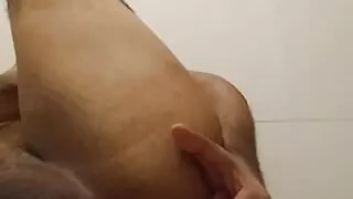 Pig slave playing with candy