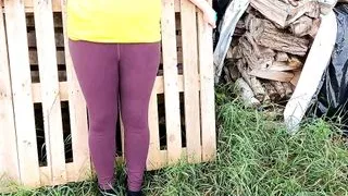 Naked tits slapped in open field