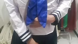 Asian crossdresser masturbating wearing japanese sailor uniform cosplay