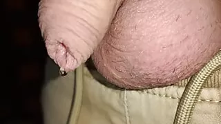 A small cock of a young gay pissing