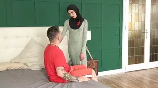 A woman in hijab needs to use both holes