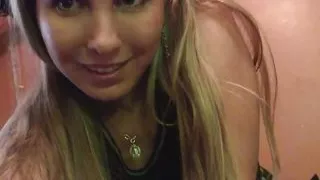 Blonde beauty has fun stripping her clothes off