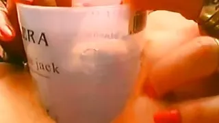 Granny inserts a whole head of lettuce into her pussy