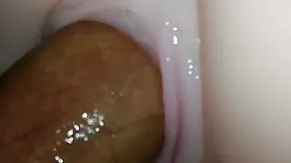 Close up toy fuck and cum on feet soles