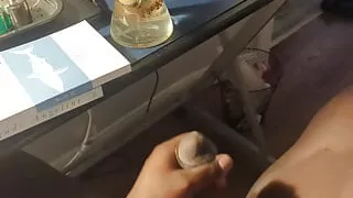 ZZ strokes cock at desk