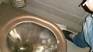 Huge cum shot in public toillete Austria highway rest area. Sperm all over the place