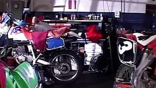 Biker chick gets her ride fixed for free by giving blowjobs to both repair guys
