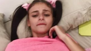 the stepsister lay down to rest and I put my penis into her little mouth