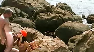 Skinny curly haired slut adores sucking dicks of all shapes and sizes on the beach